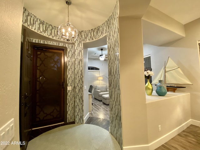 2042 W Periwinkle Way, Chandler, AZ 85248 - corridor featuring wood finished floors, baseboards, and a chandelier