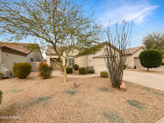 view of front of property with a garage