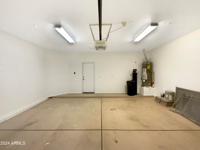 garage with a garage door opener and gas water heater