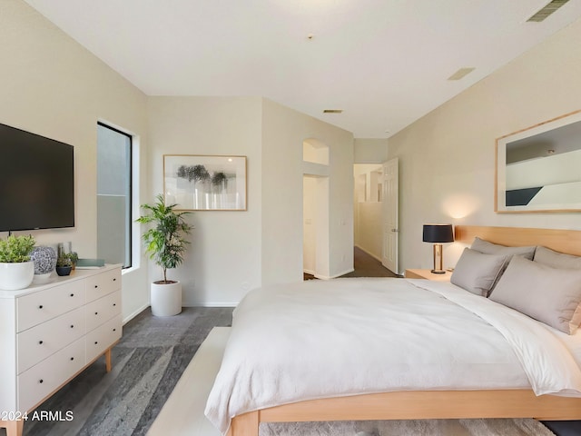 bedroom featuring dark hardwood / wood-style floors