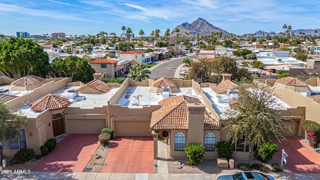 drone / aerial view featuring a mountain view