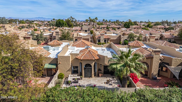 birds eye view of property featuring a residential view and a mountain view