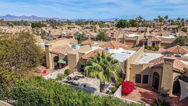 aerial view featuring a residential view and a mountain view