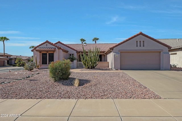 view of front of property with a garage