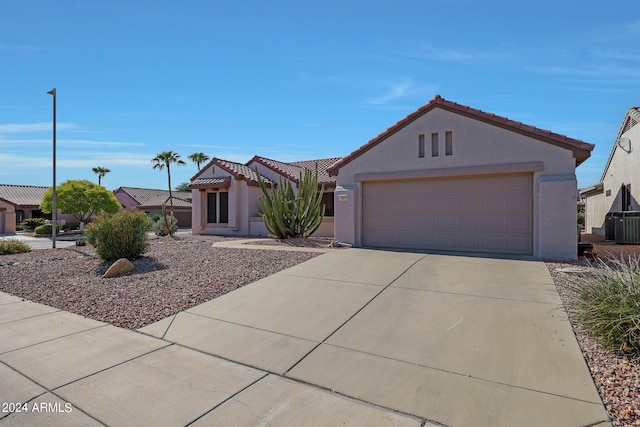 view of front of home with a garage