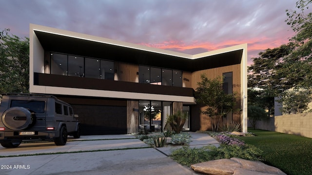 view of front of property featuring a garage