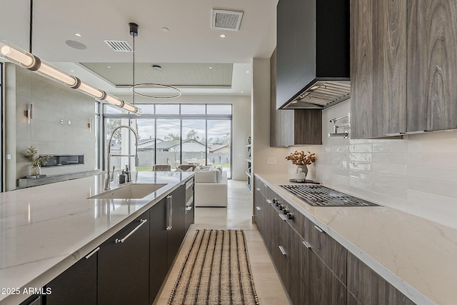 4414 N 29th St, Phoenix, AZ 85016 - kitchen featuring a sink, modern cabinets, backsplash, wall chimney exhaust hood, and recessed lighting