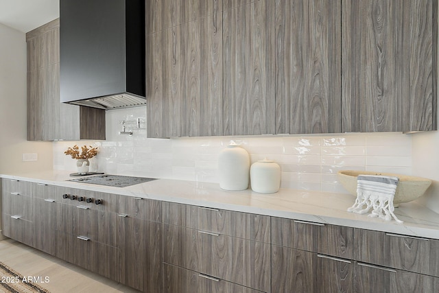 4414 N 29th St, Phoenix, AZ 85016 - kitchen with wall chimney exhaust hood, modern cabinets, and tasteful backsplash