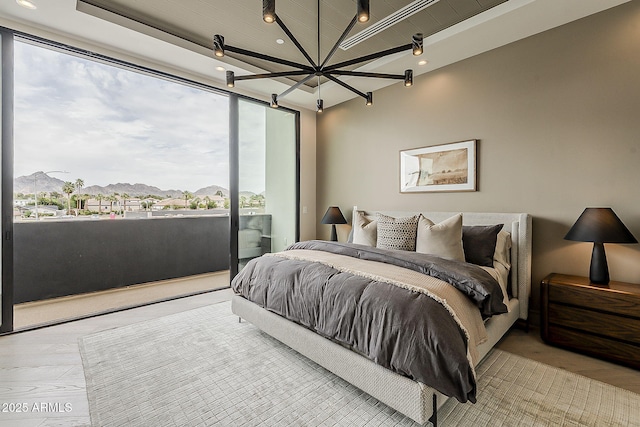 4414 N 29th St, Phoenix, AZ 85016 - bedroom with a chandelier, access to outside, wood finished floors, and recessed lighting