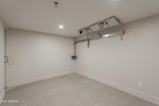 4414 N 29th St, Phoenix, AZ 85016 - laundry area with baseboards and recessed lighting