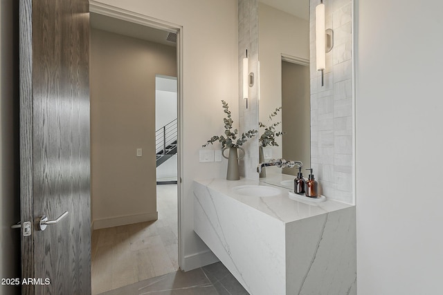 4414 N 29th St, Phoenix, AZ 85016 - bathroom featuring vanity and baseboards