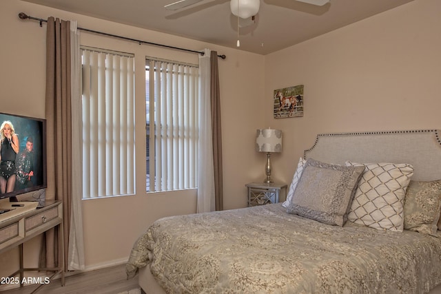 19777 N 76th St Unit 2142, Scottsdale, AZ 85255 - bedroom featuring wood finished floors and ceiling fan