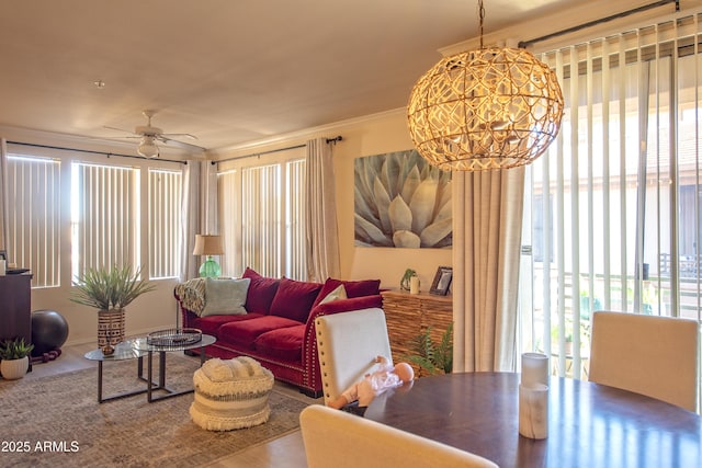 19777 N 76th St Unit 2142, Scottsdale, AZ 85255 - living area with healthy amount of natural light, a ceiling fan, crown molding, and wood finished floors