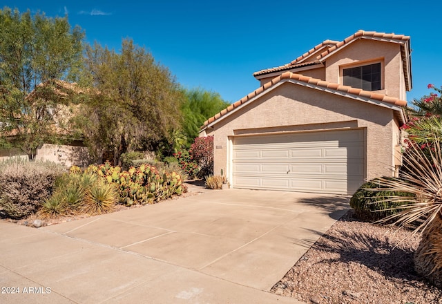 exterior space featuring a garage