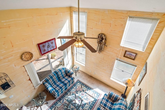 living room featuring ceiling fan