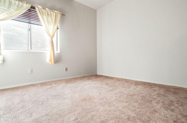 empty room with carpet floors