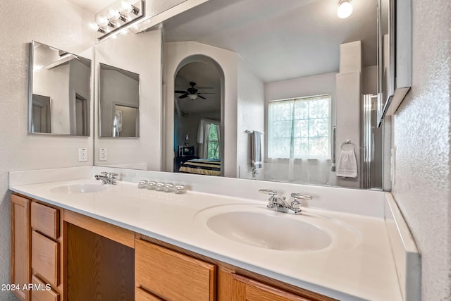 bathroom featuring vanity and ceiling fan