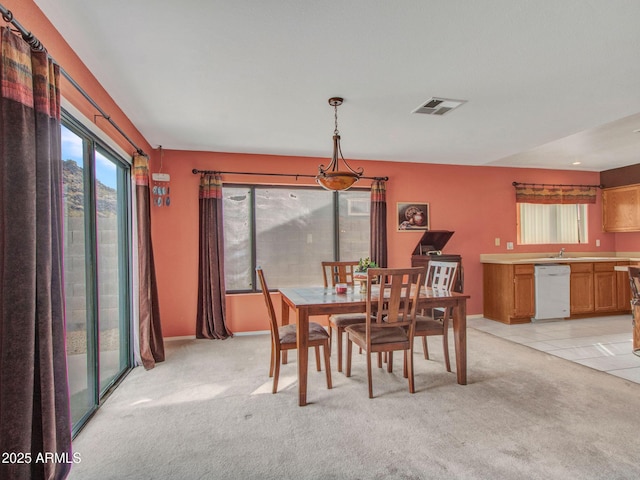 view of carpeted dining space