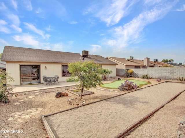 back of house featuring a patio and central AC unit