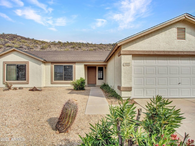 ranch-style house with a garage