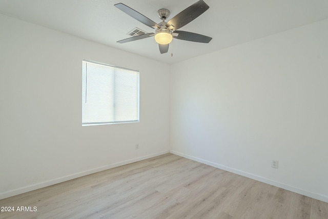 unfurnished room featuring ceiling fan and light hardwood / wood-style floors