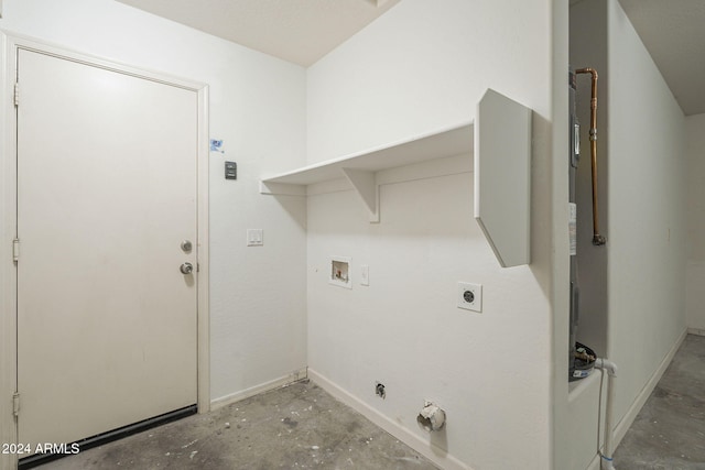 clothes washing area featuring hookup for an electric dryer and hookup for a washing machine