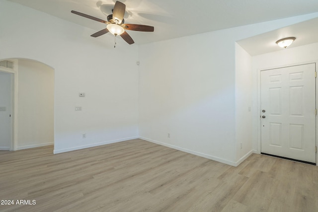 spare room featuring ceiling fan and light hardwood / wood-style floors