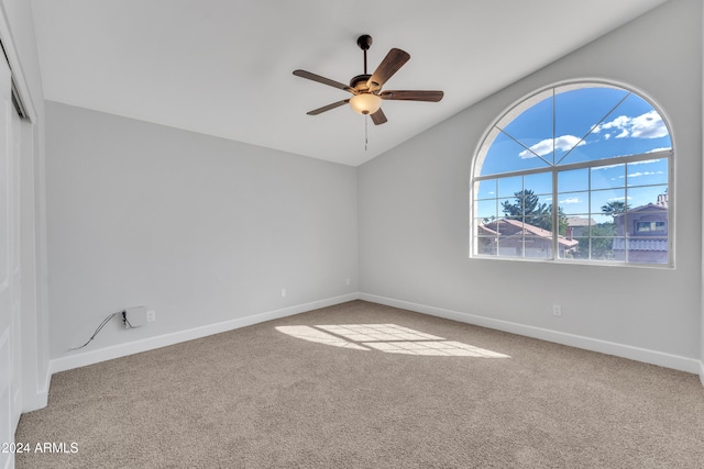 unfurnished room featuring carpet and ceiling fan