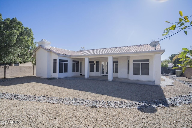 rear view of property with a patio area