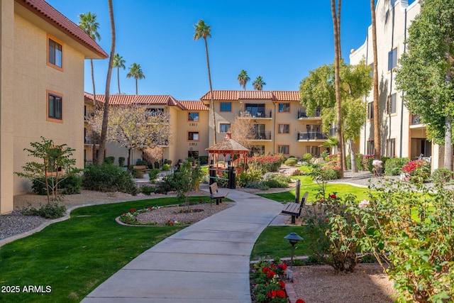 view of community with a gazebo and a lawn