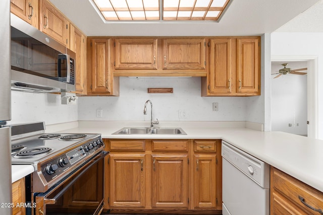 kitchen featuring sink, ceiling fan, and appliances with stainless steel finishes