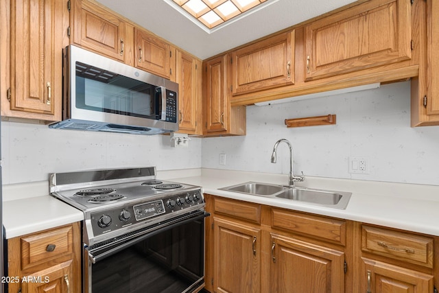 kitchen featuring sink and electric stove