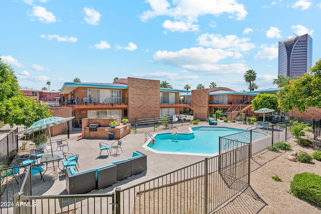 view of pool featuring a patio area