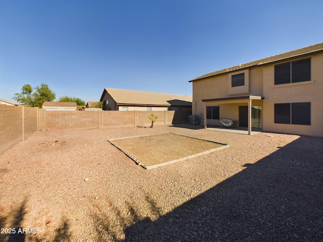 8022 S 48th Dr, Laveen, AZ 85339 - fenced backyard with a patio and cooling unit