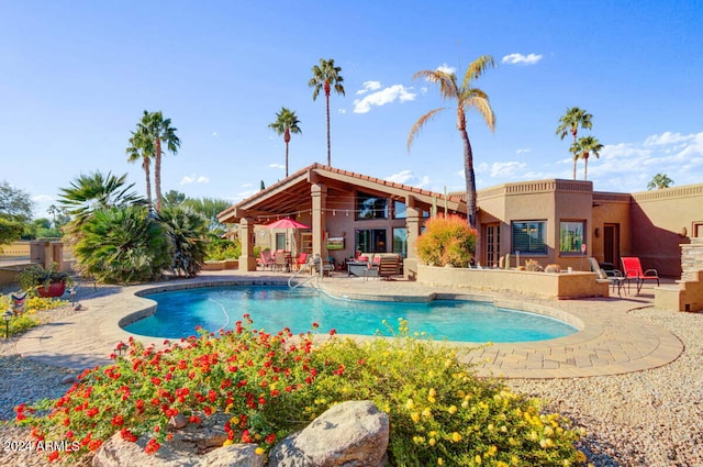 view of swimming pool featuring a patio area