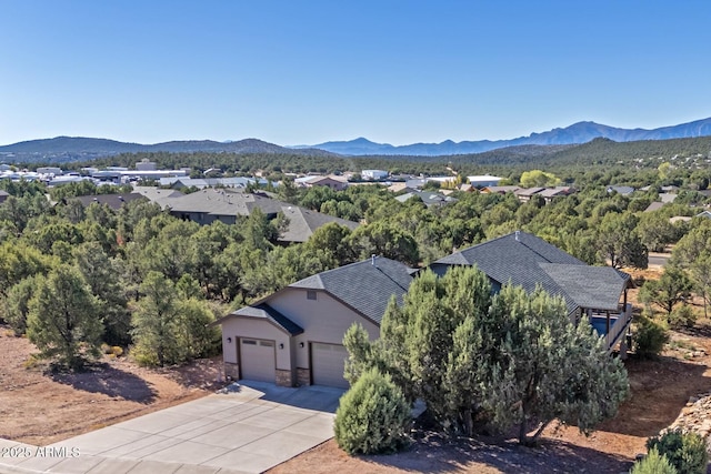 drone / aerial view featuring a mountain view