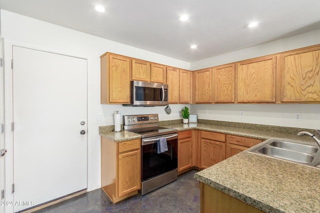 kitchen featuring stainless steel appliances and sink