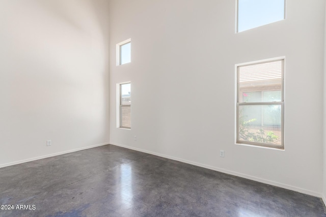 spare room with a high ceiling