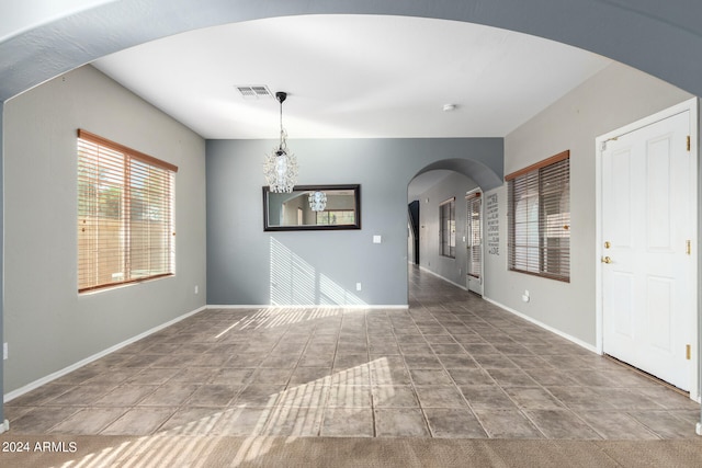 interior space featuring an inviting chandelier