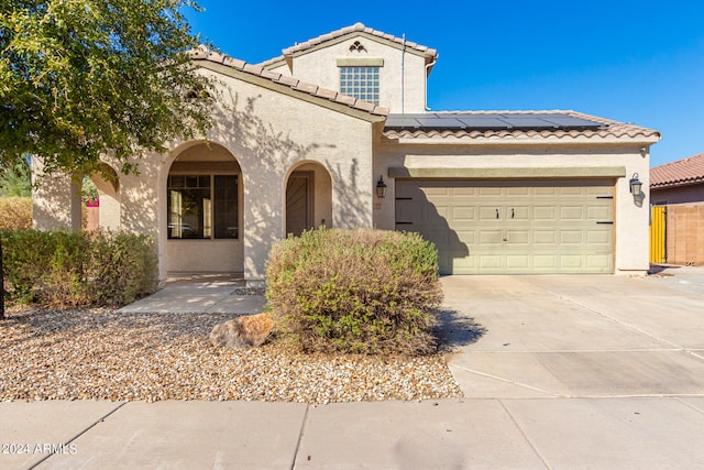 view of front of home with a garage