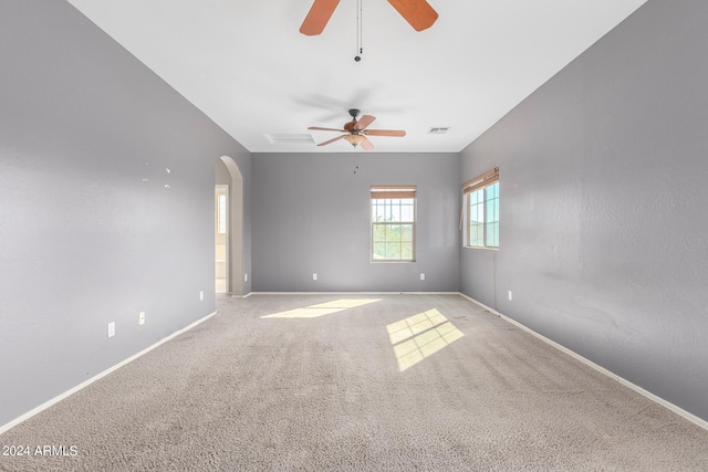 unfurnished room with light carpet and ceiling fan