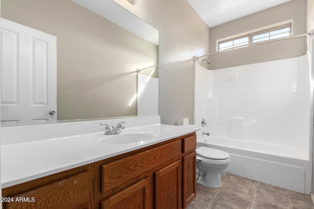 full bathroom featuring shower / bathing tub combination, vanity, and toilet