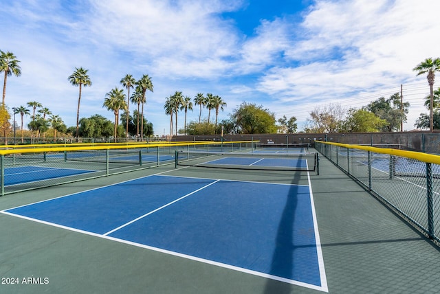 view of sport court featuring basketball hoop