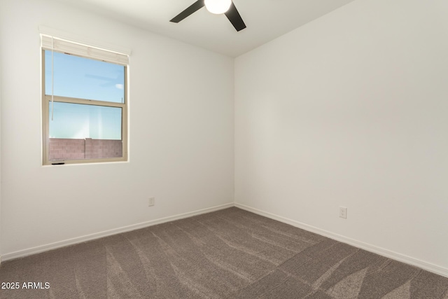 empty room featuring ceiling fan and carpet floors