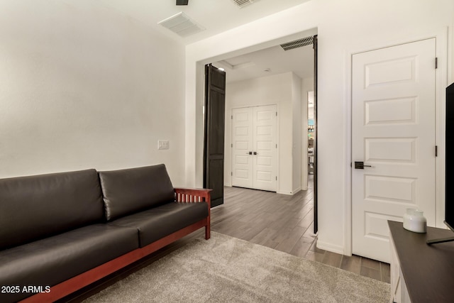 living room featuring wood-type flooring