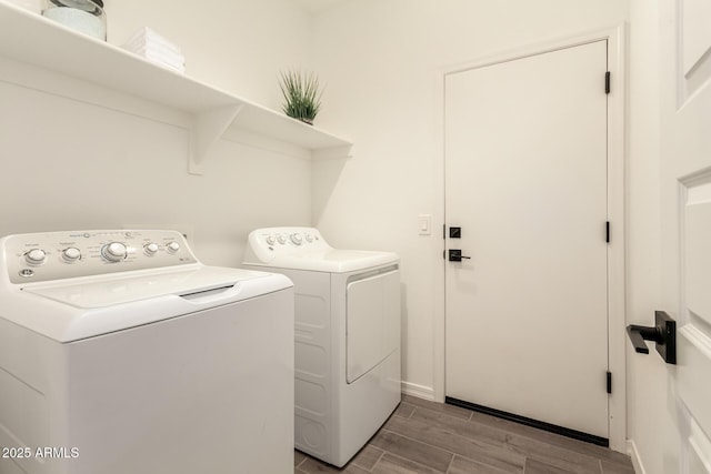 washroom with washer and clothes dryer