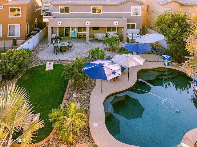 view of pool featuring a patio