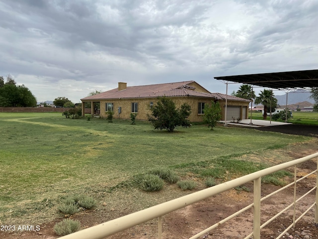 view of yard with a garage