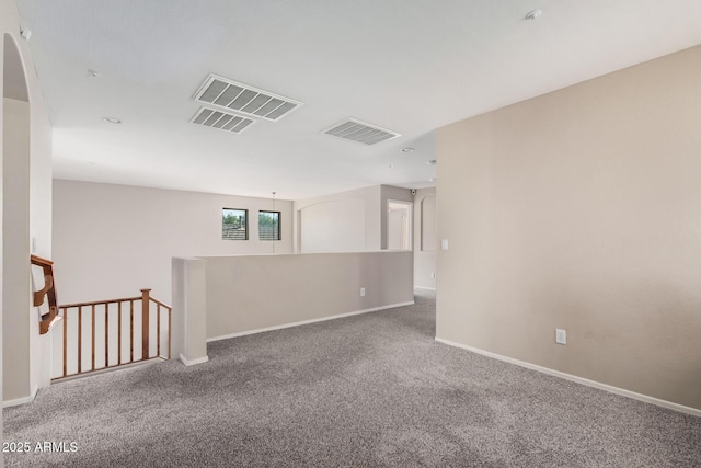 unfurnished room with carpet flooring