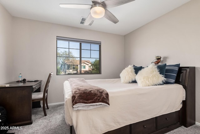 bedroom featuring ceiling fan and light carpet